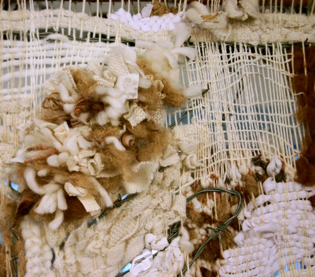 rug + barbed wire detail